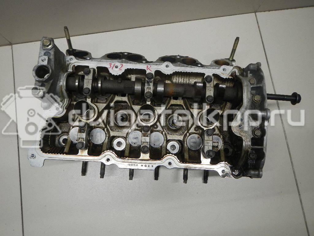 Фото Головка блока для двигателя VQ25DD для Nissan Skyline / Gloria / Cedric / Stagea 200-215 л.с 24V 2.5 л бензин {forloop.counter}}