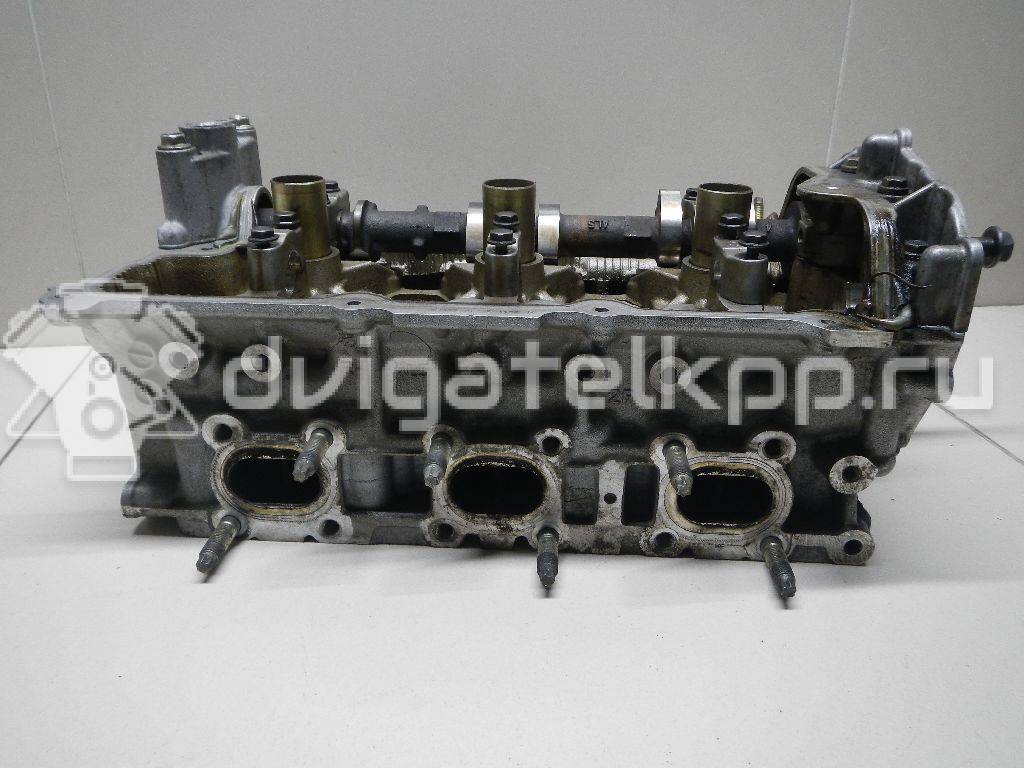 Фото Головка блока для двигателя VQ25DD для Nissan Skyline / Gloria / Cedric / Stagea 200-215 л.с 24V 2.5 л бензин {forloop.counter}}