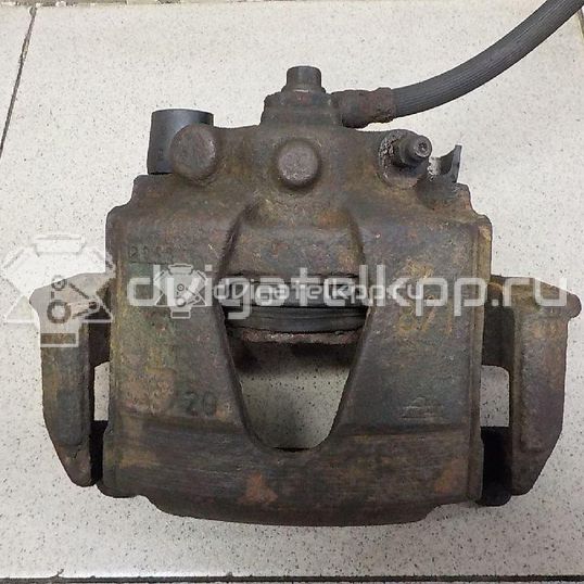 Фото Суппорт тормозной передний левый  90421729 для daewoo Lanos