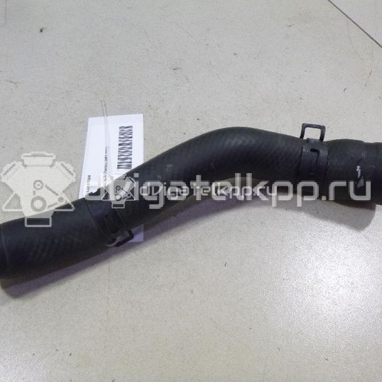 Фото Патрубок радиатора  MN135915 для Mitsubishi Lancer