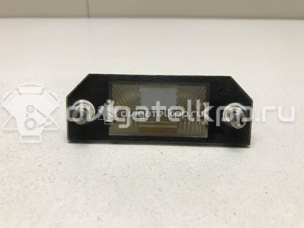 Фото Фонарь подсветки номера  4502331 для Ford Focus / C-Max {forloop.counter}}