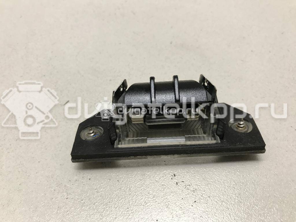 Фото Фонарь подсветки номера  4502331 для Ford Focus / C-Max {forloop.counter}}