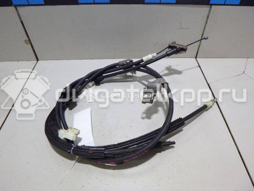 Фото Трос стояночного тормоза  1755767 для Ford Focus / C-Max {forloop.counter}}