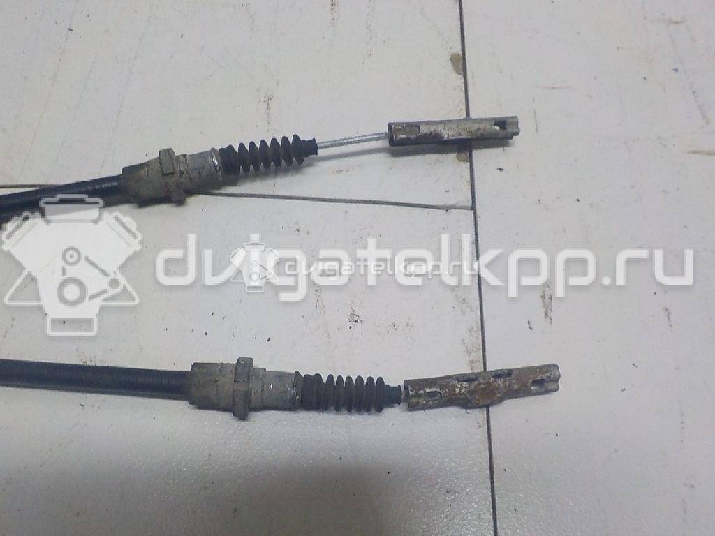 Фото Трос стояночного тормоза  1850157 для Ford Ecosport {forloop.counter}}