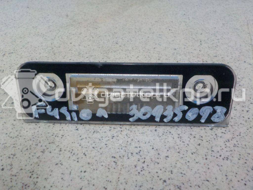 Фото Фонарь подсветки номера  1332916 для Ford Fiesta / Mondeo / Fusion Ju {forloop.counter}}