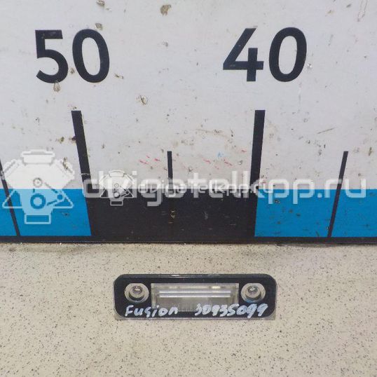 Фото Фонарь подсветки номера  1332916 для Ford Fiesta / Mondeo / Fusion Ju