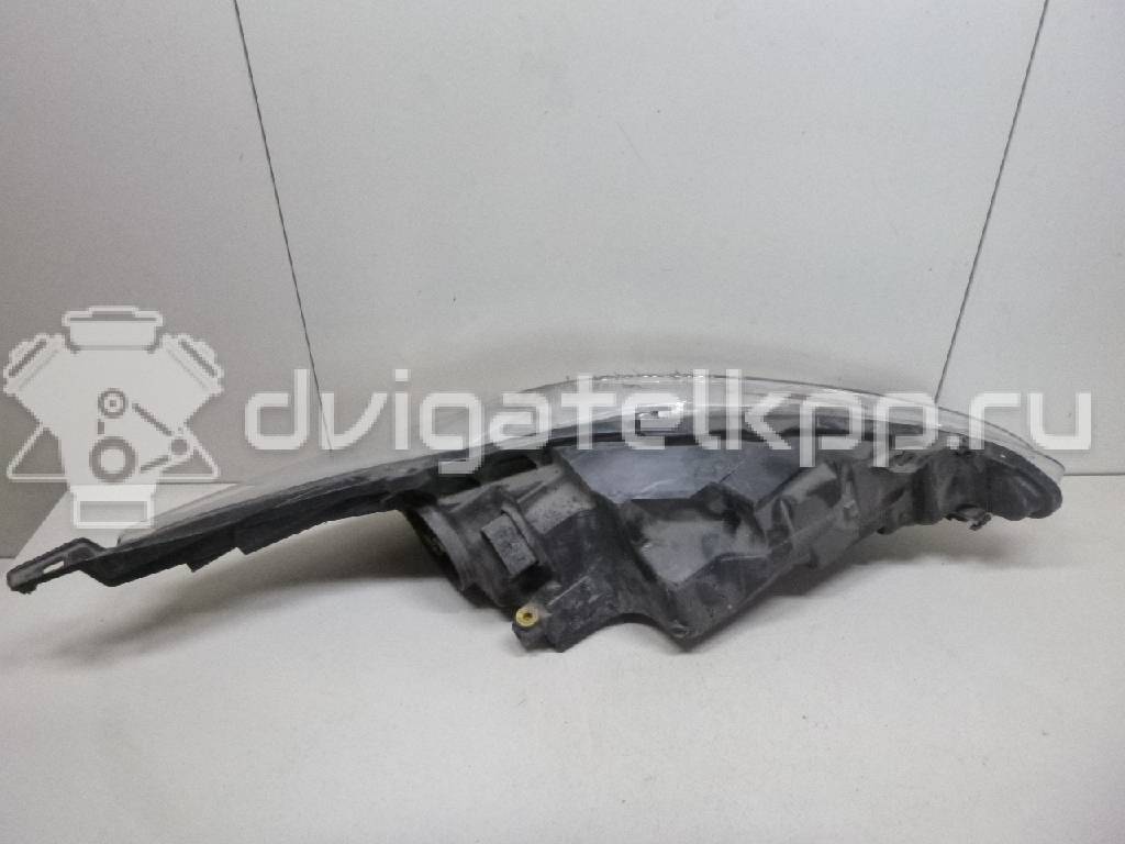 Фото Фара левая  1740028 для Ford Fiesta {forloop.counter}}