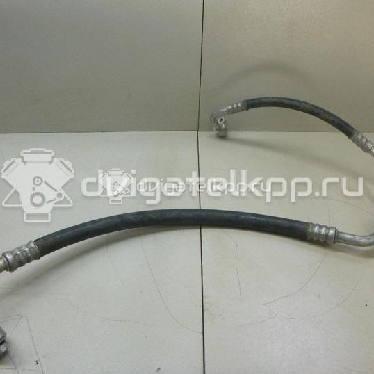 Фото Трубка кондиционера  1339393 для Ford Focus