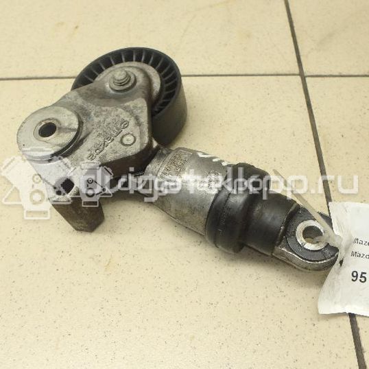 Фото Ролик-натяжитель ручейкового ремня  PE0315980 для Mazda Cx-5 / Cx-3 Dk / 6 / 3
