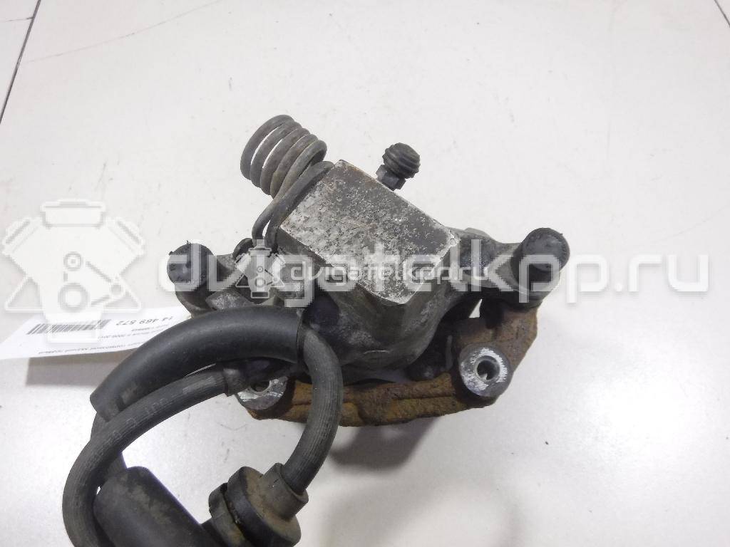 Фото Суппорт тормозной задний правый  1365648 для mazda Mazda 3 (BK) {forloop.counter}}