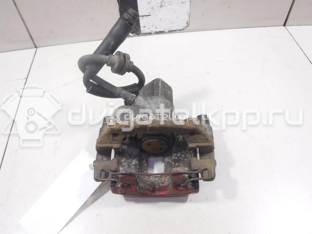 Фото Суппорт тормозной задний правый  1365648 для mazda Mazda 3 (BK) {forloop.counter}}