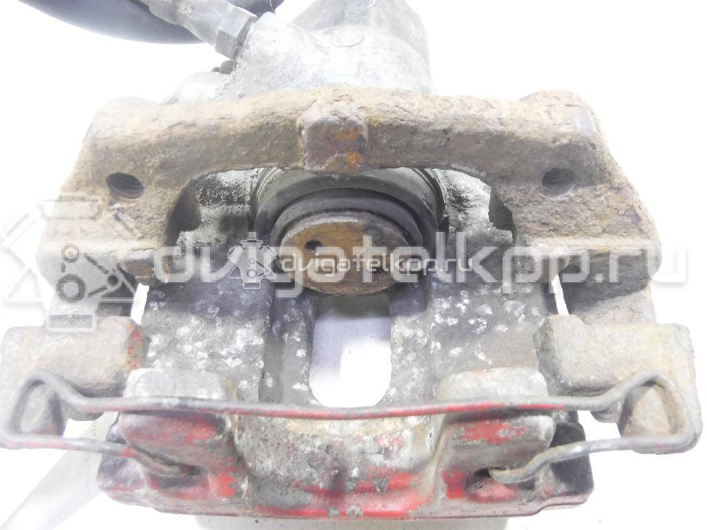 Фото Суппорт тормозной задний правый  1365648 для mazda Mazda 3 (BK) {forloop.counter}}