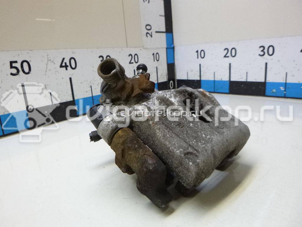 Фото Суппорт тормозной задний левый  1365653 для mazda Mazda 3 (BK) {forloop.counter}}