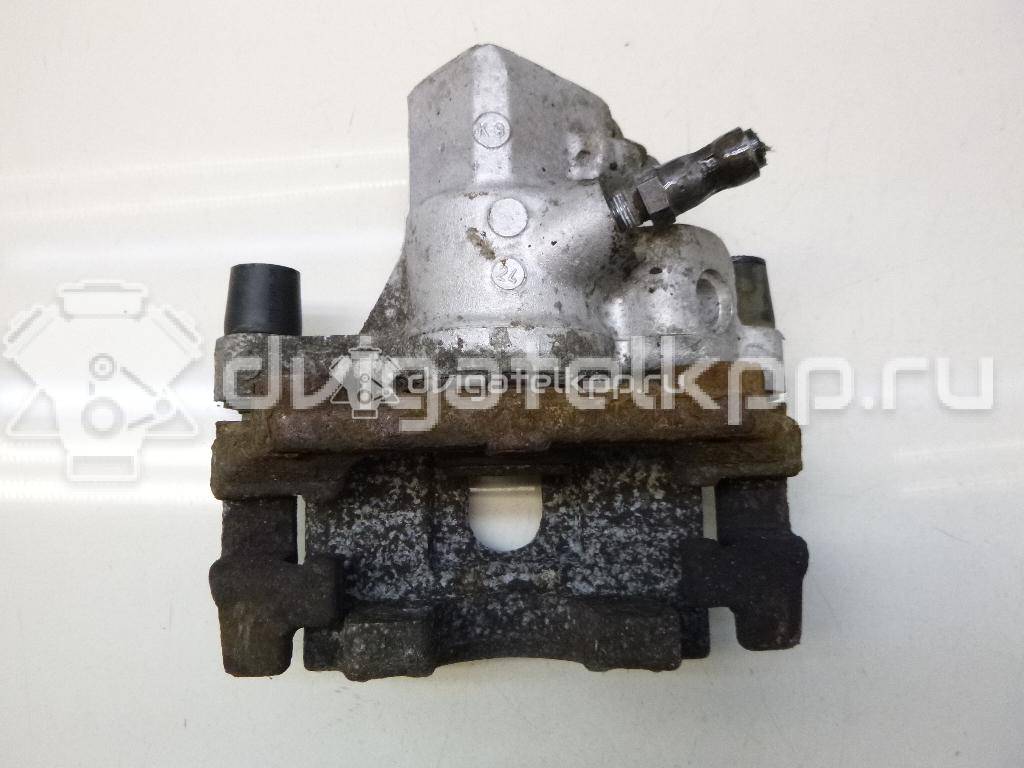 Фото Суппорт тормозной задний левый  1365653 для mazda Mazda 3 (BK) {forloop.counter}}