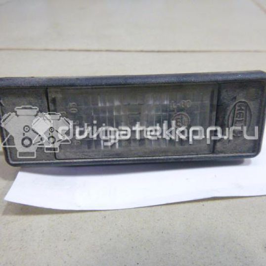 Фото Фонарь подсветки номера  26510AU300 для Nissan Primera / Micra / Note / Nv200 / Np300
