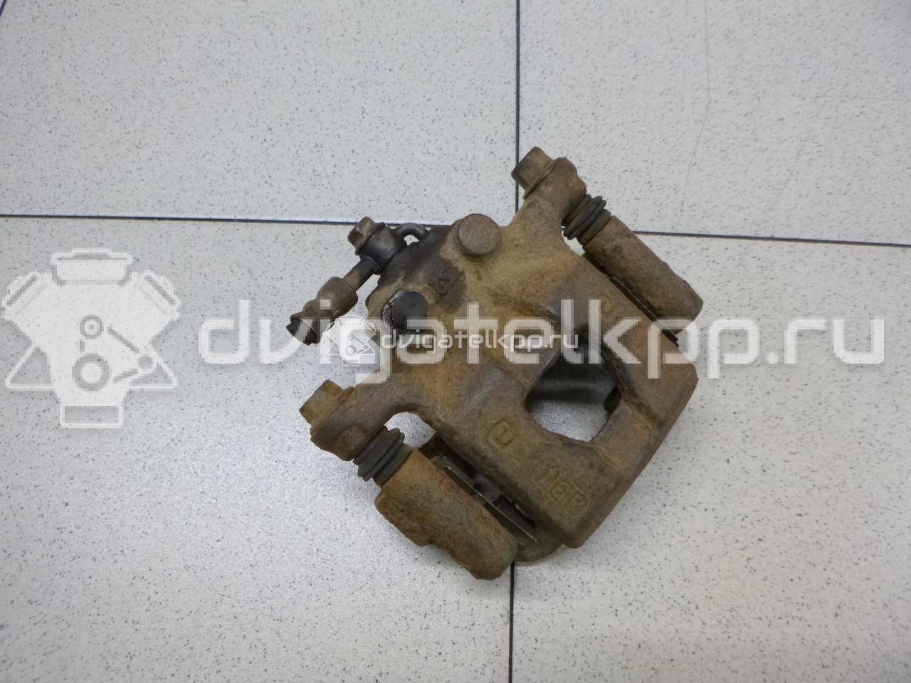 Фото Суппорт тормозной задний левый  440111KD0A для Nissan Tiida / Qashqai / Cube Z12 / Juke F15 / Pulsar C13 {forloop.counter}}