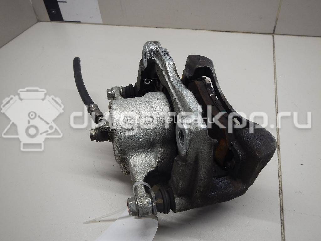 Фото Суппорт тормозной передний правый  410014EA0A для Nissan Qashqai {forloop.counter}}