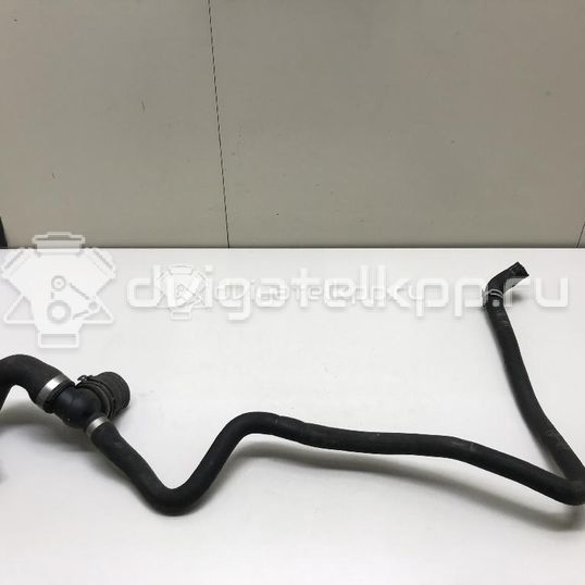 Фото Патрубок радиатора  13118272 для Opel Astra / Zafira