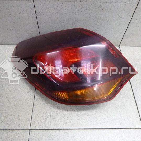 Фото Фонарь задний наружный левый  1222209 для Opel Astra