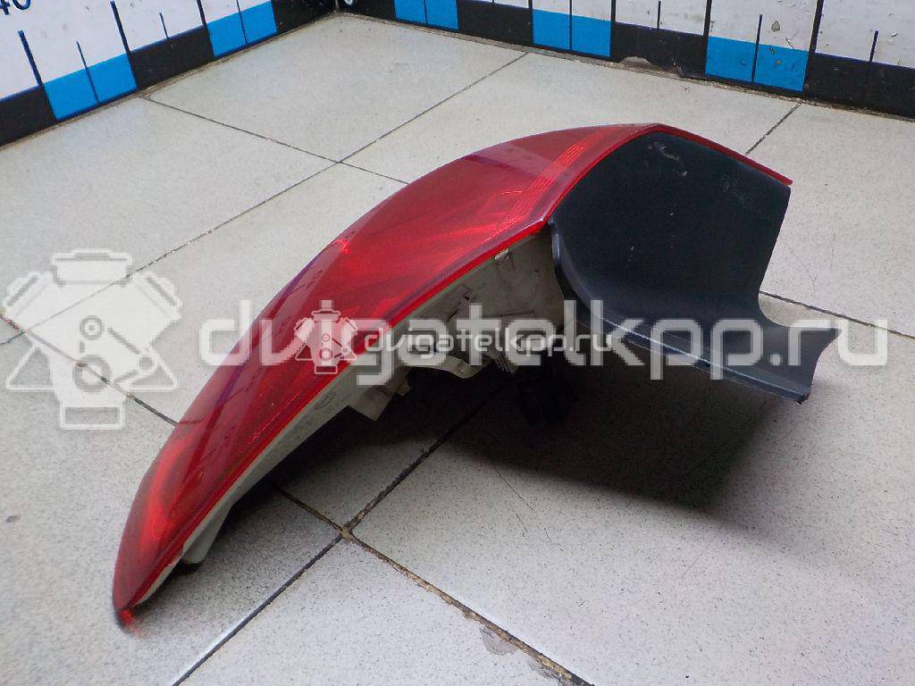 Фото Фонарь задний наружный левый  13306453 для Opel Astra {forloop.counter}}