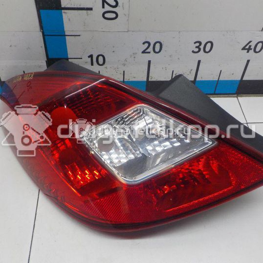 Фото Фонарь задний левый  1222138 для Opel Corsa