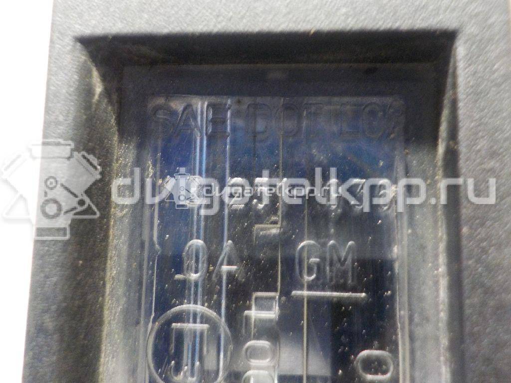 Фото Фонарь подсветки номера  13251936 для Opel Astra / Corsa {forloop.counter}}