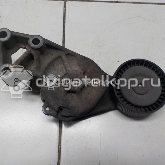 Фото Ролик руч.ремня с кронштейном  038903315f для Seat Ibiza / Leon / Toledo / Alhambra / Altea