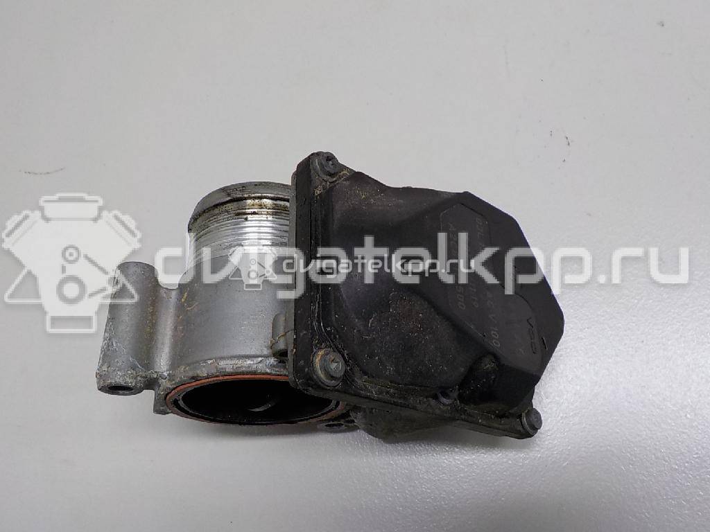 Фото Заслонка дроссельная электрическая  03L128063AC для Skoda Roomster 5J / Octaviaii 1Z3 / Yeti 5L / Fabia / Octavia {forloop.counter}}