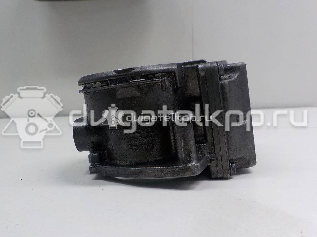 Фото Заслонка дроссельная электрическая  03G128063J для Skoda Roomster 5J / Octaviaii 1Z3 / Yeti 5L / Fabia / Octavia {forloop.counter}}