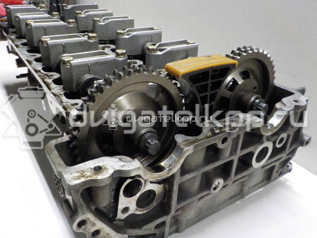 Фото Головка блока для двигателя D27DT для Ssang Yong Rexton / Rodius / Kyron / Stavic 161-176 л.с 20V 2.7 л Дизельное топливо {forloop.counter}}
