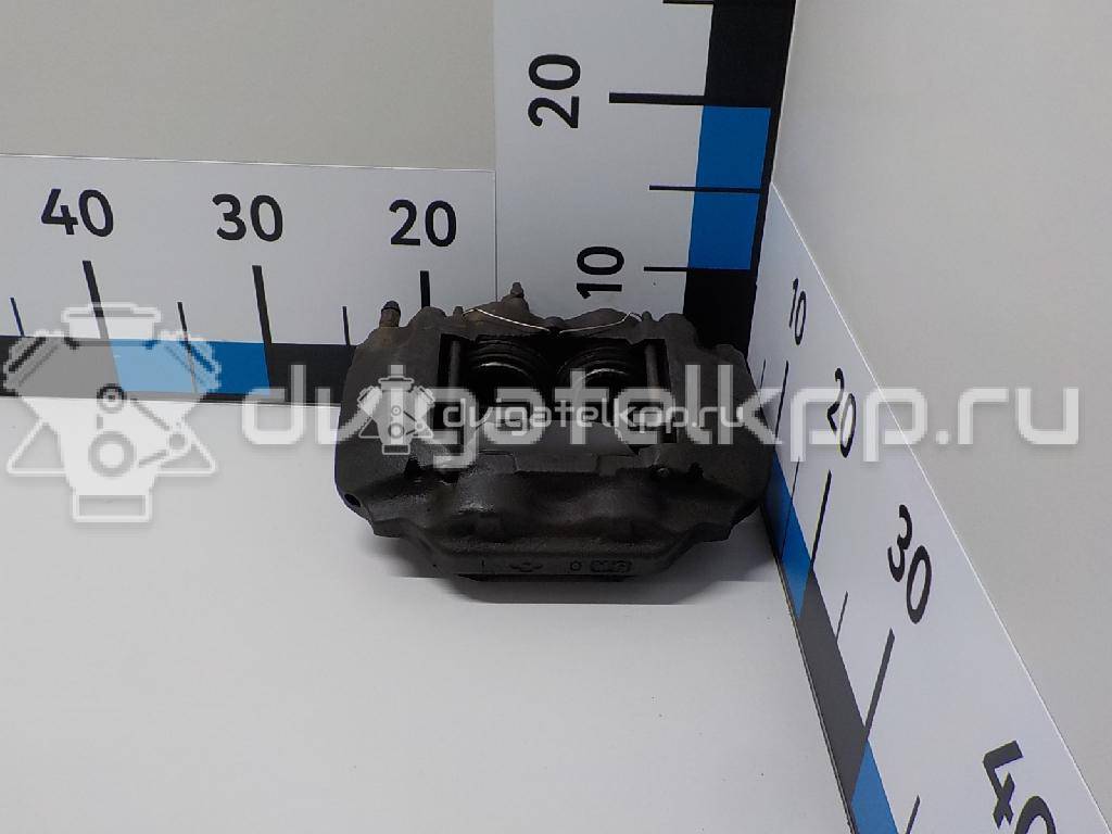 Фото Суппорт тормозной передний левый  4775060090 для Toyota Land Cruiser {forloop.counter}}