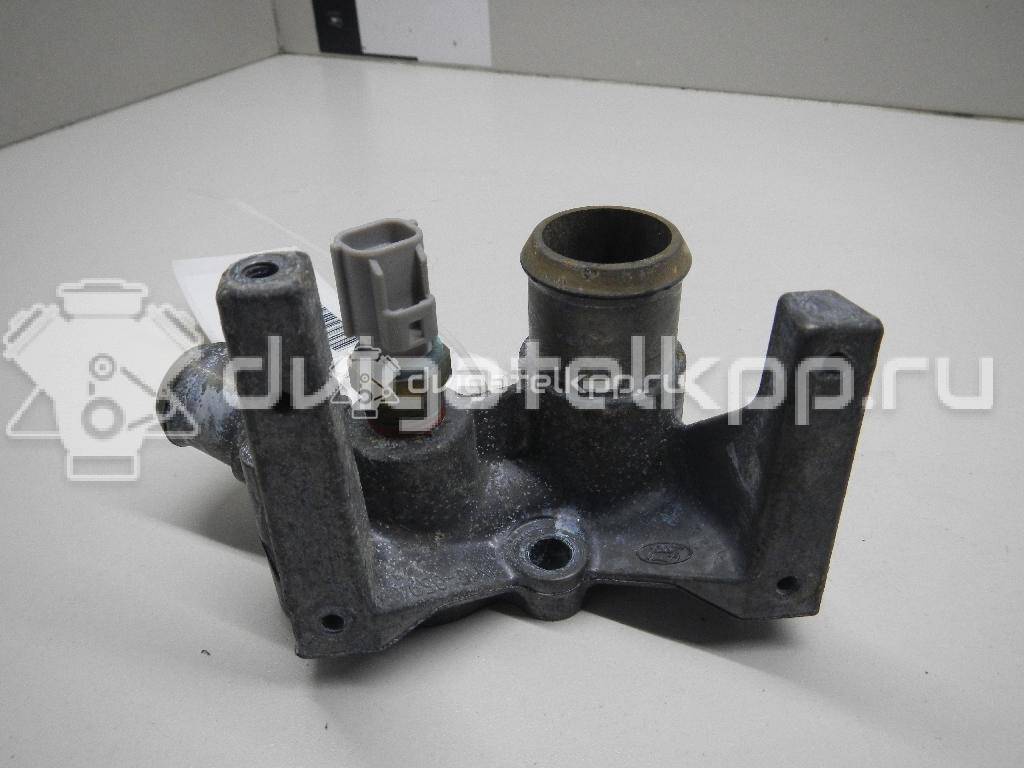 Фото Фланец двигателя системы охлаждения  1221325 для Ford Fiesta / Focus / Puma Ec {forloop.counter}}