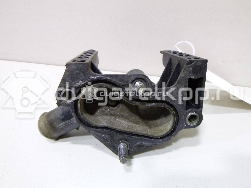 Фото Фланец двигателя системы охлаждения  7m5g8k556ac для Ford Fiesta / Focus / Puma Ec / Fusion Ju {forloop.counter}}