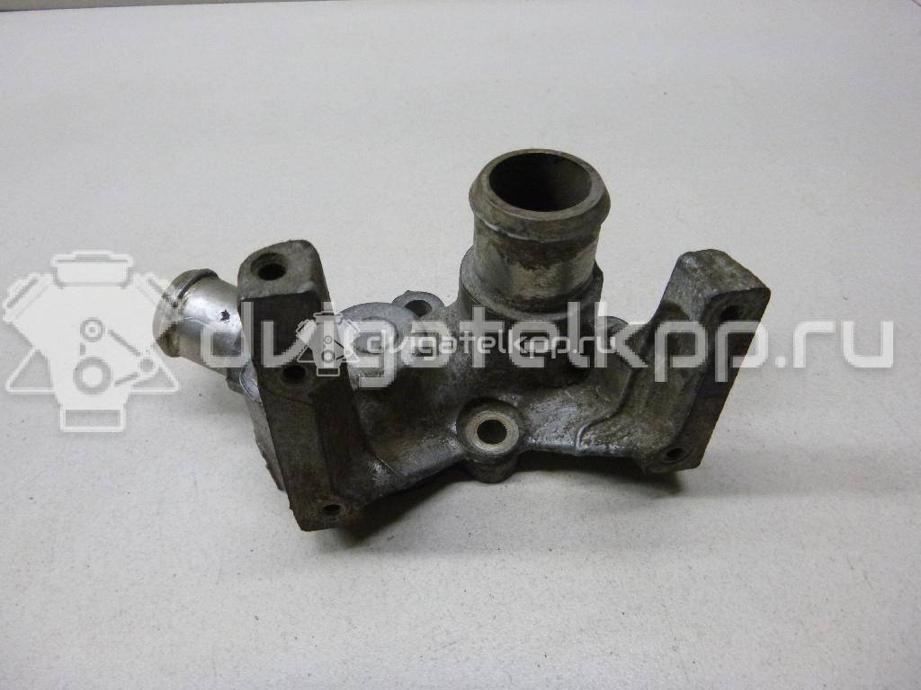Фото Фланец двигателя системы охлаждения  1301772 для Ford Fiesta / Focus / Puma Ec {forloop.counter}}