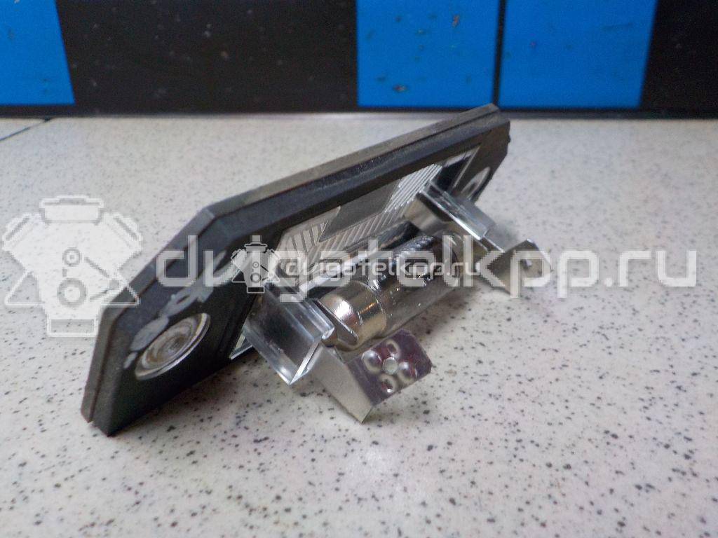 Фото Фонарь подсветки номера  4502331 для Ford Focus / C-Max {forloop.counter}}