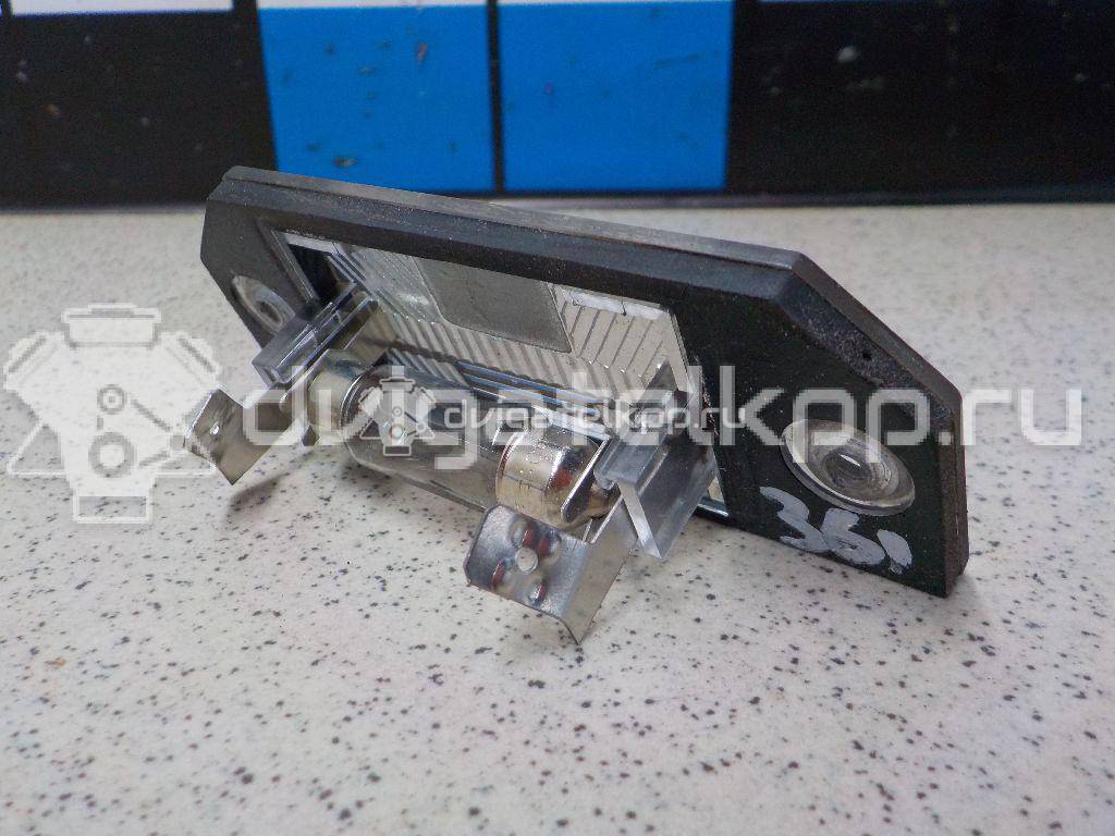 Фото Фонарь подсветки номера  4502331 для Ford Focus / C-Max {forloop.counter}}