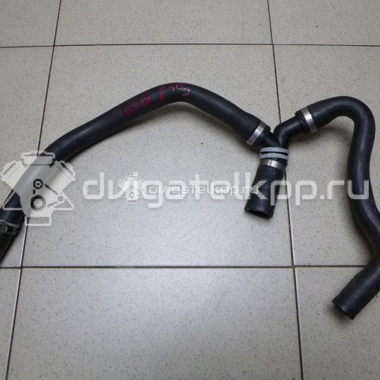 Фото Патрубок радиатора  1722086 для Ford Focus