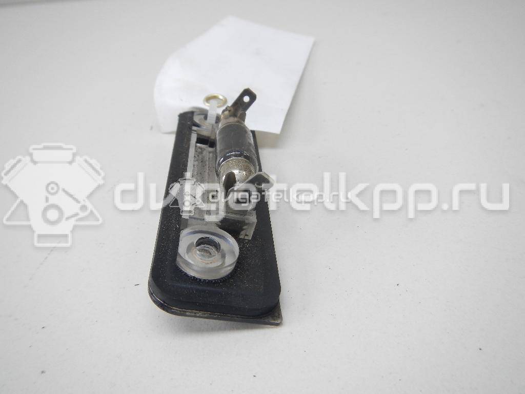 Фото Фонарь подсветки номера  1332916 для Ford Fiesta / Mondeo / Fusion Ju {forloop.counter}}