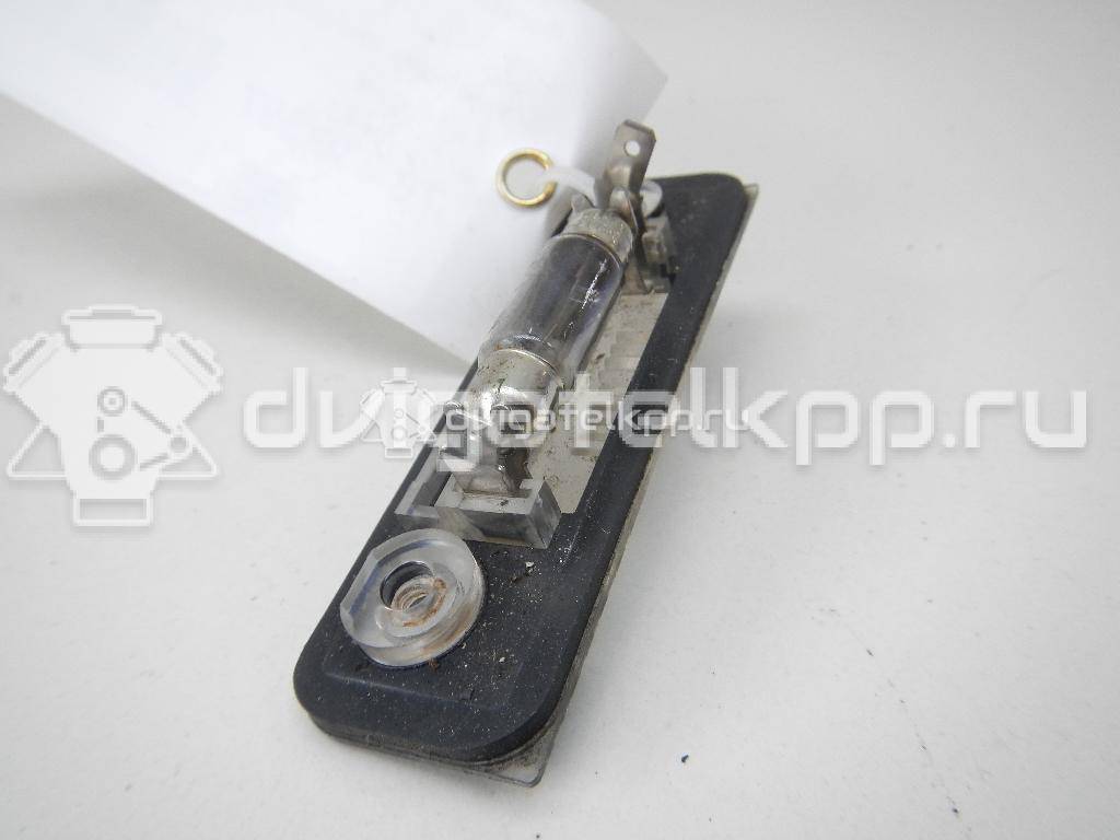 Фото Фонарь подсветки номера  1332916 для Ford Fiesta / Mondeo / Fusion Ju {forloop.counter}}