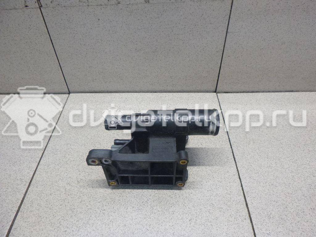 Фото Фланец двигателя системы охлаждения  1450955 для Ford Fiesta / Focus / Tourneo / C-Max / Galaxy {forloop.counter}}