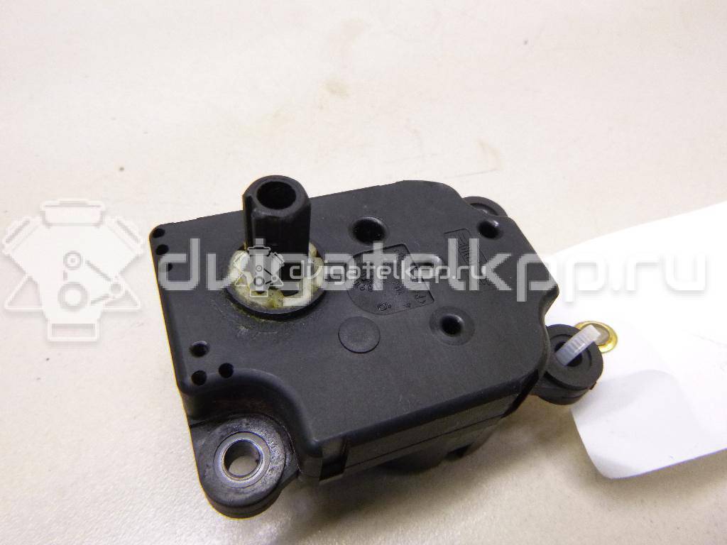 Фото Моторчик заслонки отопителя  1S7H19E616AA для Ford Focus / Mondeo {forloop.counter}}