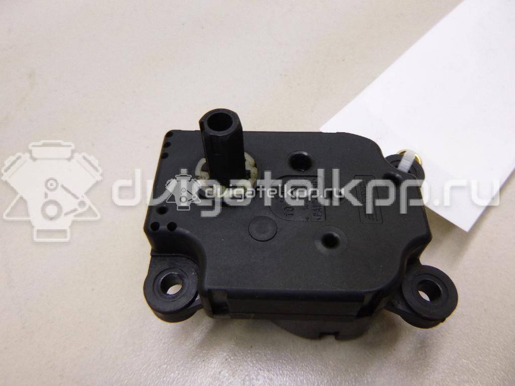 Фото Моторчик заслонки отопителя  1S7H19E616AA для Ford Focus / Mondeo {forloop.counter}}
