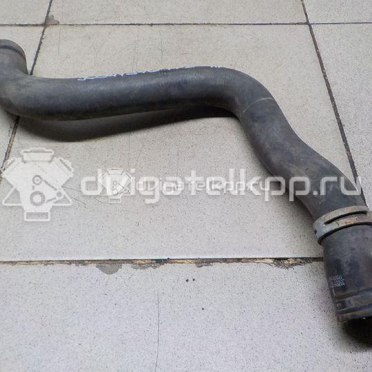 Фото Патрубок радиатора  1490677 для Ford Focus / C-Max