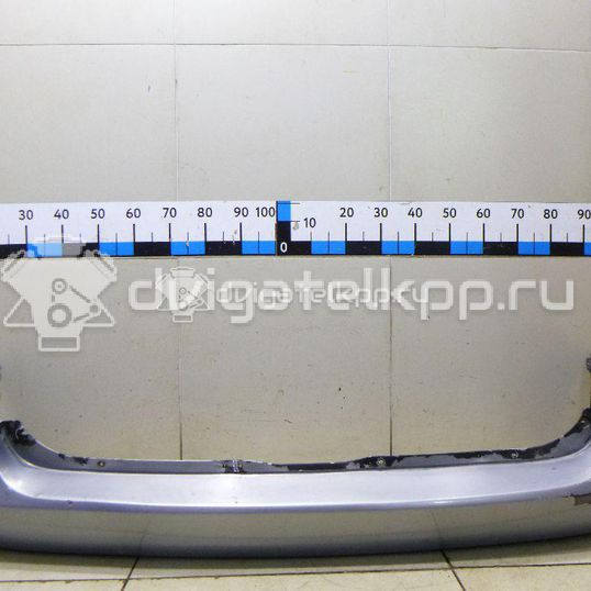 Фото Бампер задний  1404145 для Opel Astra