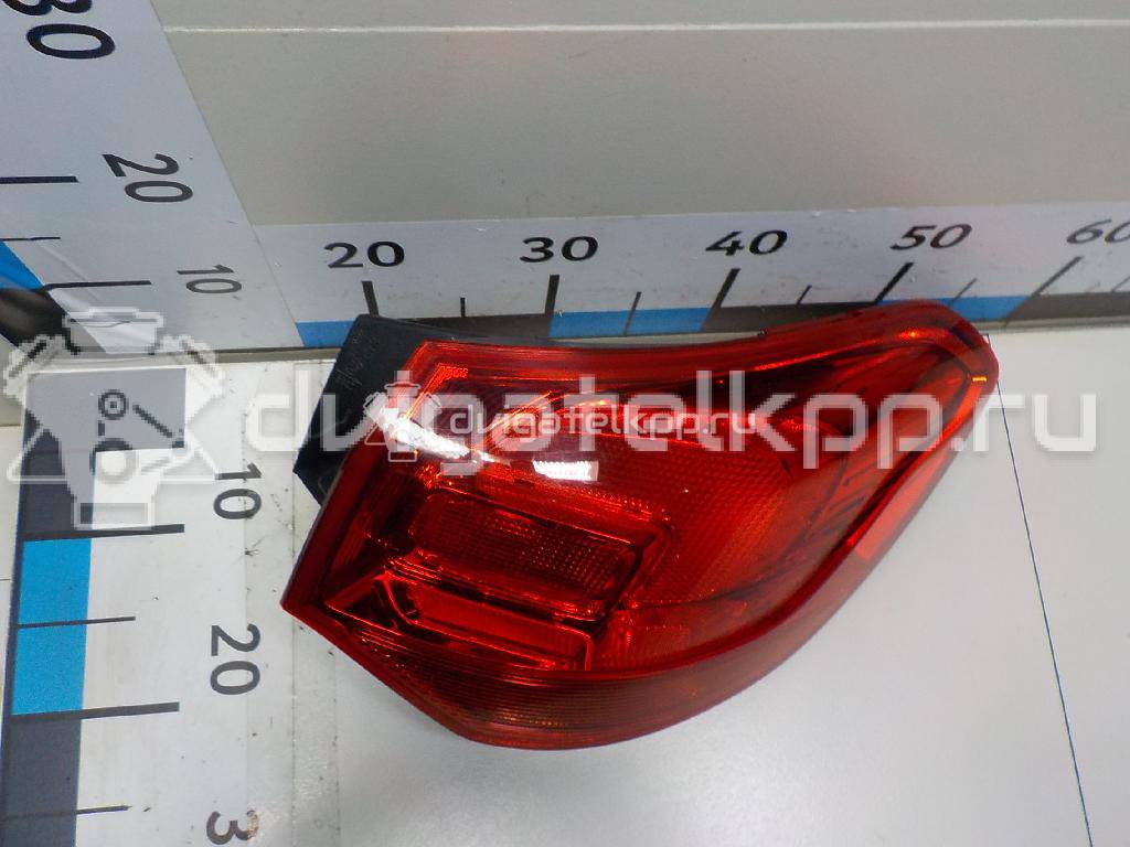 Фото Фонарь задний наружный правый  13282243 для Opel Astra {forloop.counter}}