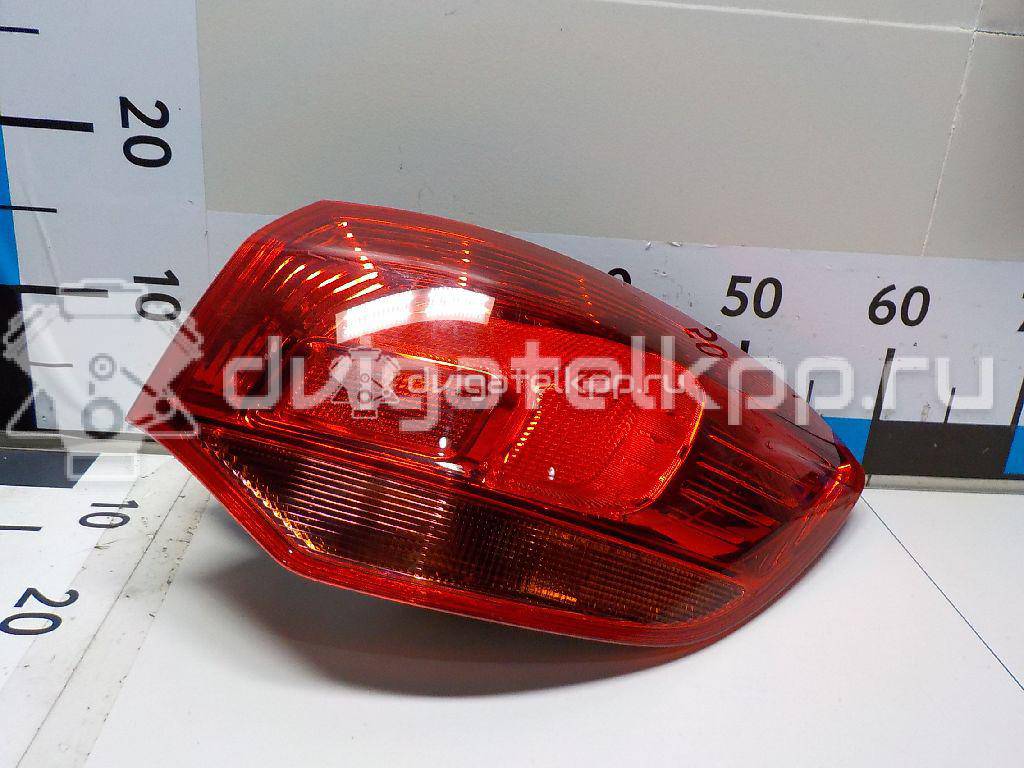 Фото Фонарь задний наружный правый  13282243 для Opel Astra {forloop.counter}}