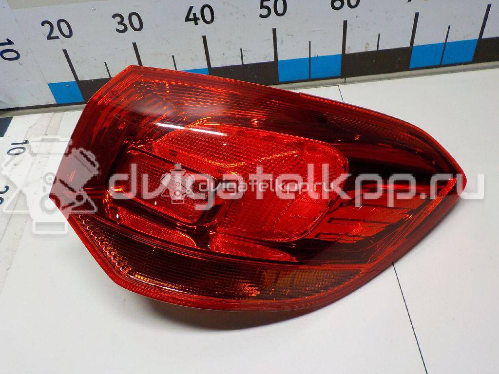 Фото Фонарь задний наружный правый  13282243 для Opel Astra {forloop.counter}}