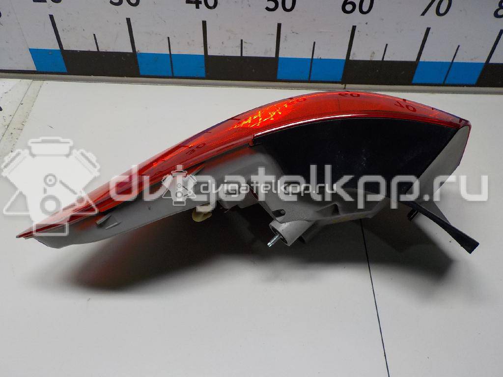 Фото Фонарь задний наружный правый  13282243 для Opel Astra {forloop.counter}}