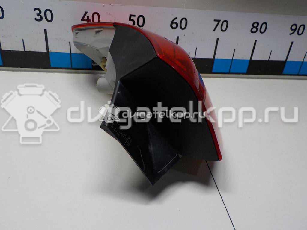 Фото Фонарь задний наружный правый  13282243 для Opel Astra {forloop.counter}}