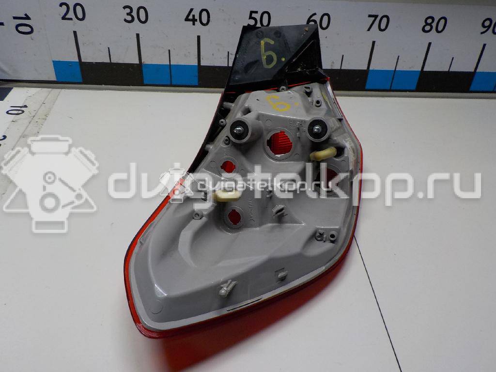 Фото Фонарь задний наружный правый  13282243 для Opel Astra {forloop.counter}}
